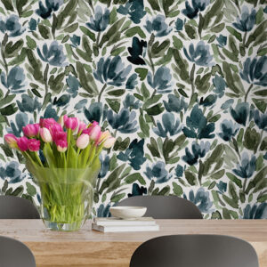 Tulip Vines by Canadian artist Sabina Maria bursts with expressive energy, bringing painterly florals to life in bold strokes of inky green, soft sage, and stormy blue. This hand-painted design mimics the fluidity of watercolour on paper, with layered tulip shapes and leafy vines flowing organically across a crisp white background. 