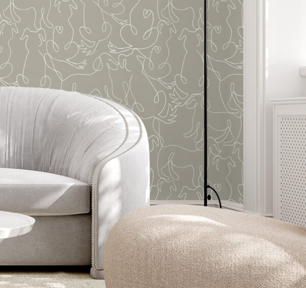 "A Dog's Love" Wallpaper by Sabina Maria Designed by Canadian artist Sabina Maria, A Dog’s Love is a playful yet elegant wallpaper pattern that celebrates the joyful spirit of dogs through minimalist line art. Each pup is rendered in a continuous white line that dances across a warm, dark beige background, creating a sense of movement and charm. The seamless repetition gives it a modern, whimsical touch, perfect for dog lovers looking to add character to a nursery, hallway, or creative space. This design blends simplicity with personality, making it both soothing and expressive.