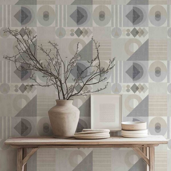 A zoomed-in Bauhaus wallpaper with abstract geometric forms in cream, taupe, and grey, styled with minimalist furniture.