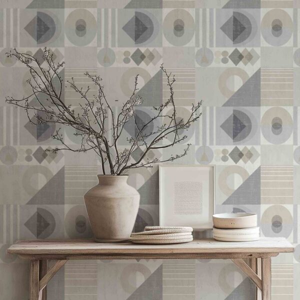 A zoomed-in Bauhaus wallpaper with abstract geometric forms in cream, taupe, and grey, styled with minimalist furniture.