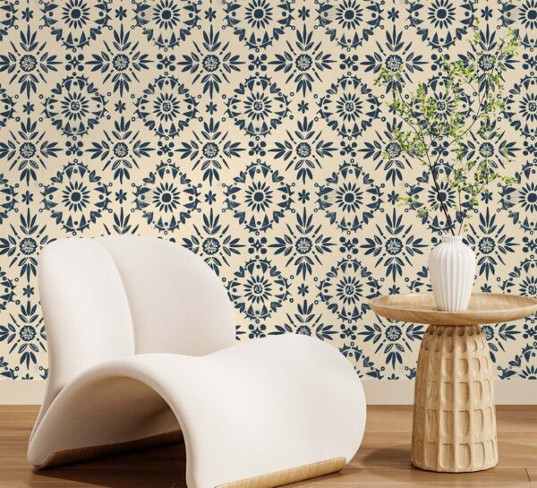 A zoomed-in hand-painted floral wallpaper featuring deep blue folk-inspired motifs on a warm beige background, blending traditional charm with modern simplicity