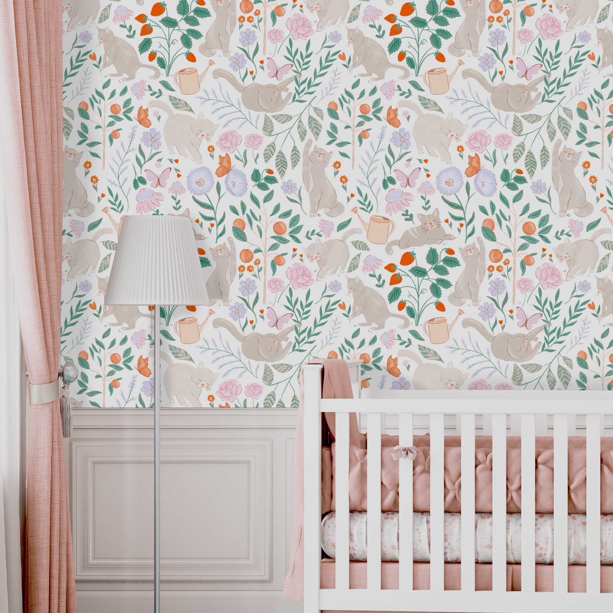 Purrfect Garden Wallpaper | Peel & Stick Wallpaper Online | Proudly Made in Canada A Purrfect Garden wallpaper showing whimsical cats among pastel flowers and greenery, styled with blush curtains, a white crib, and soft bedding
