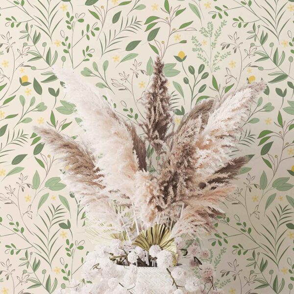 A zoomed-in elegant leafy floral wallpaper with green foliage and yellow accents in a bright interior