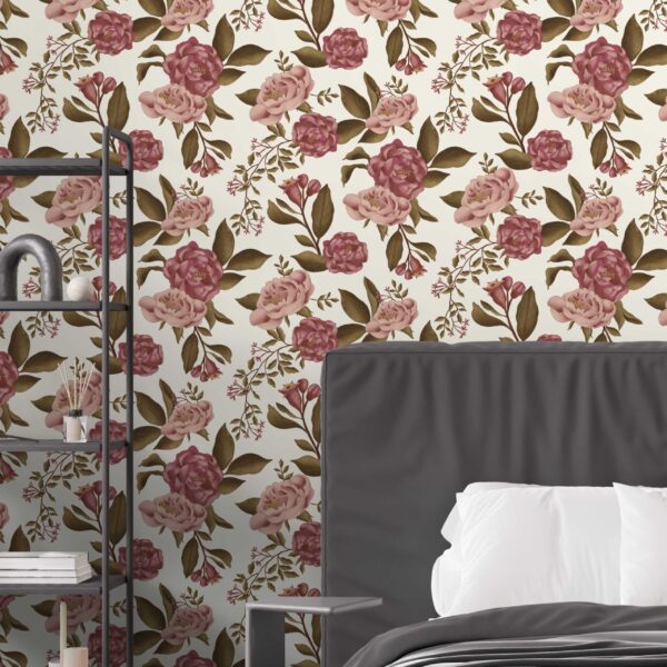 Zoomed-in Victorian Blooms Light peel and stick wallpaper with dusty rose florals and olive green leaves behind a modern charcoal bed and black metal shelving in a moody bedroom
