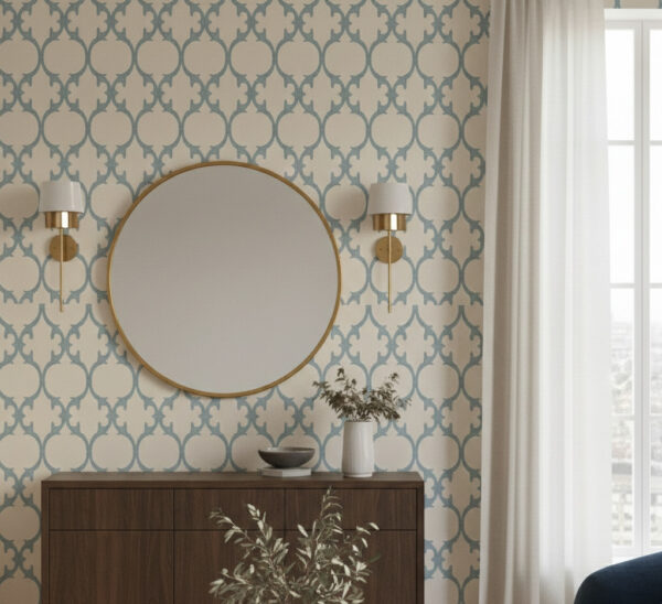 A close-up of chambray blue ogee trellis wallpaper showing fabric-like texture and soft woven finish