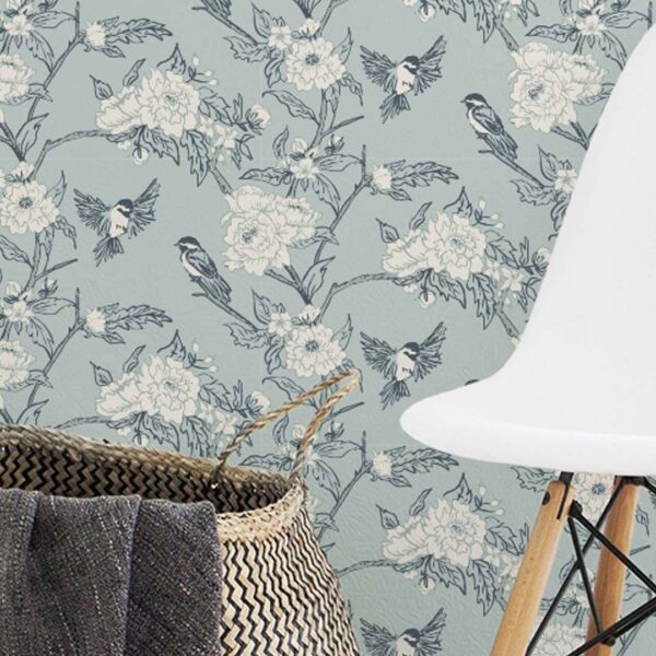 Zoomed-in misty Sage Chickadee & Bloom wallpaper full wall installation with vintage bird