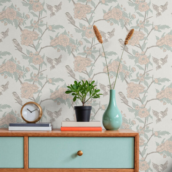 Linen Chickadee & Bloom wallpaper close-up & Bloom wallpaper in pale blue with pink blossoms styled in a modern living room