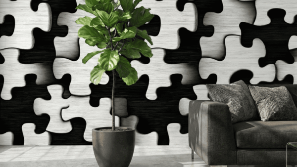 a black and white abstract jigsaw wall mural with interlocking puzzle forms.