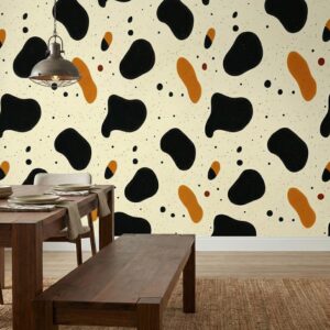 Abstract terrazzo wallpaper with black and mustard shapes on a cream background