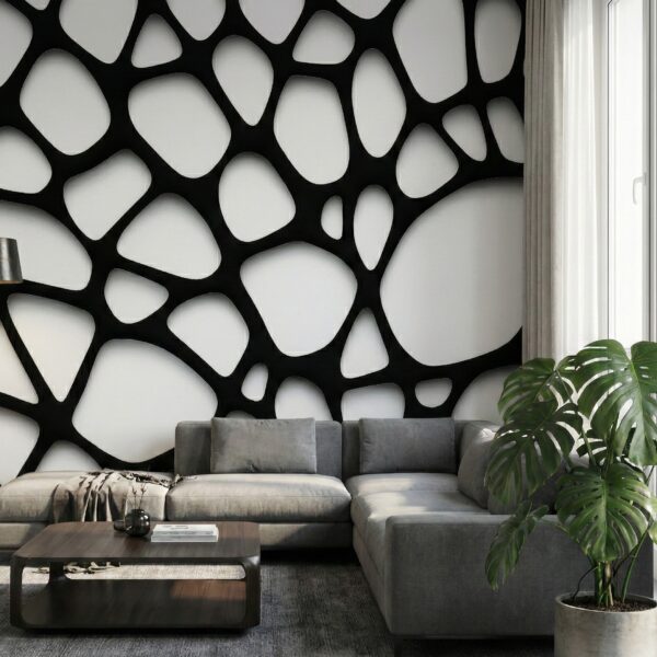 A zoomed-in of an organic black and white cellular pattern mural wrapping a contemporary living room with soft light and lush green plant.