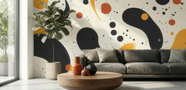 Abstract wall mural with bold black shapes and warm mustard elements on cream