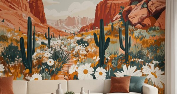 A zoomed in a desert cactus mural with rust and sage tones, styled with a cream sofa and textured cushions.