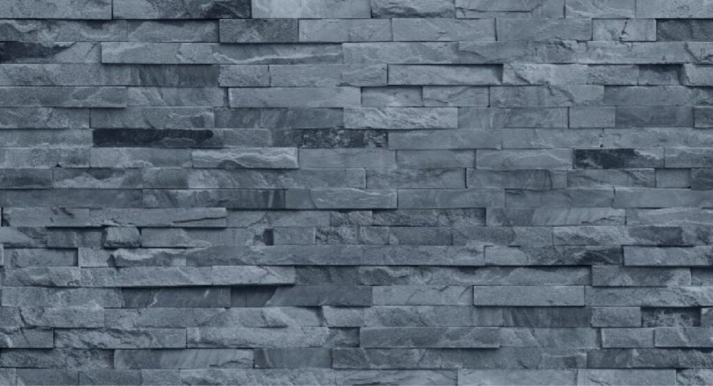 Mural Cinereal Cladding wallpaper looking like a blue-gray natural stacked stone wall