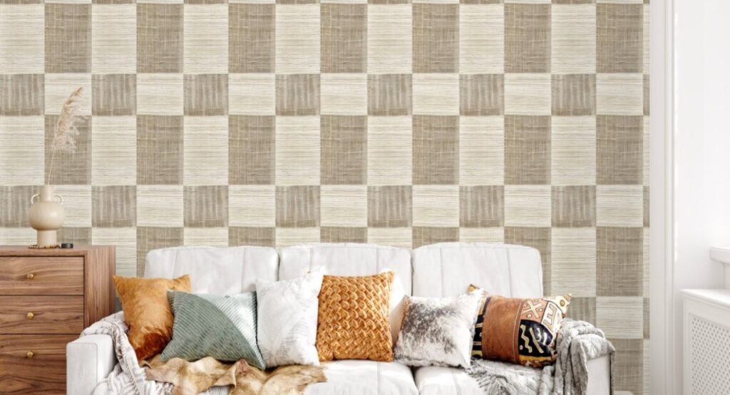 A Grasscloth Quilt Wallpaper in a well lit sitting room with a sofa and a drawer
