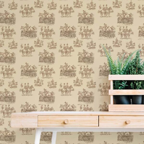 Astride at Dawn equestrian toile wallpaper behind a wooden desk with a potted fern.