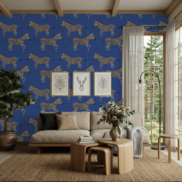 Kala Blue Zebra wallpaper in a modern living room with beige sofa and bold zebra feature wall