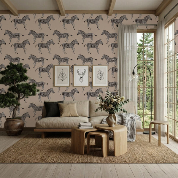 A seamless wallpaper pattern featuring hand-sketched black and white zebras walking across a warm, neutral nude-beige background.