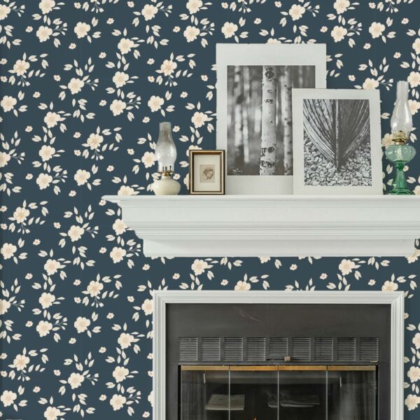 Hazel Wallpaper in Midnight Bloom with soft cream floral pattern on deep blue wall behind a fireplace mantel