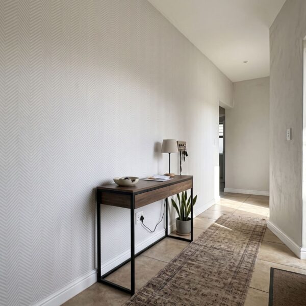 Convex Wallpaper shown in a hallway