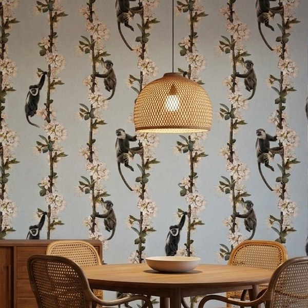 Blossom Branch Monkeys wallpaper close-up on a wall