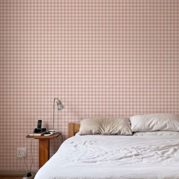 Holly Gingham Blush wallpaper close-up on a wall